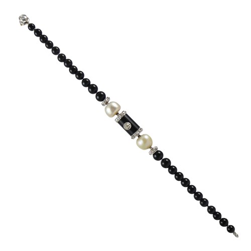 Art Deco graduated onyx bead, diamond and natural pearl bracelet by Cartier, Paris c.1920, with central onyx baton,